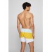 Hugo Boss Recycled-material swim shorts with colour-blocked stripe 50473919-753 Light Yellow