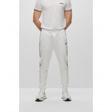 Hugo Boss Tracksuit bottoms in active-stretch fabric with side stripes 50490663-100 White
