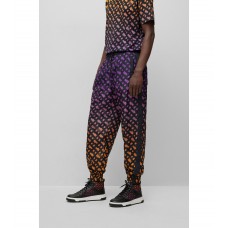 Hugo Boss BOSS x Khaby Relaxed-fit tracksuit bottoms with gradient monograms 50493298-834 Patterned